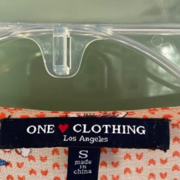 Long sleeved, V-neck, peplum style blouse - Picture 2 of 5